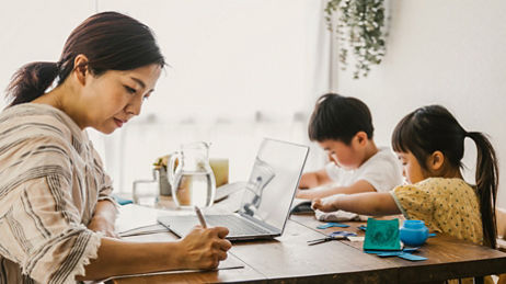 lady and kids preparing list