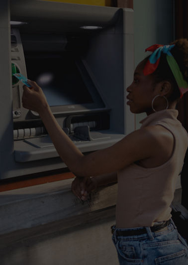 Image of a woman at an ATM